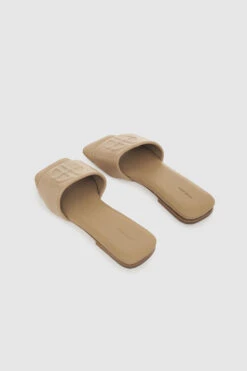 Anine Bing | Ria Slides - Butterscotch Monogram -Clothing Best Sale AB RIA SLIDES BUTTERSCOTCH MONOGRAMA 14 9100 270 3 1700x 49786488 369e 4cff b558 1f6ee7741f18
